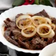 Beef Bistek Tagalog — Filipino catering Singapore